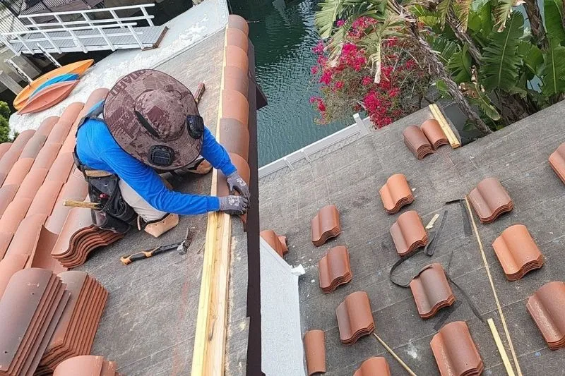 Residential Roof Worker Installing Tile Roof Residential Roof Worker Installing Tile Roof